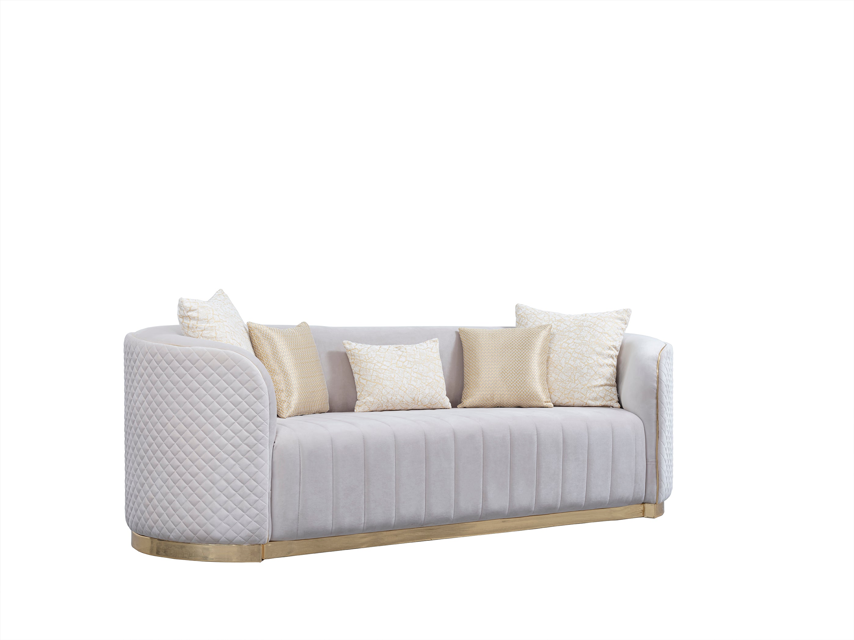 A luxurious velvet sofa with a curved low back, gold detailing on the arms and legs, and an beige cushioning fabric. The sofa is set against a white background.