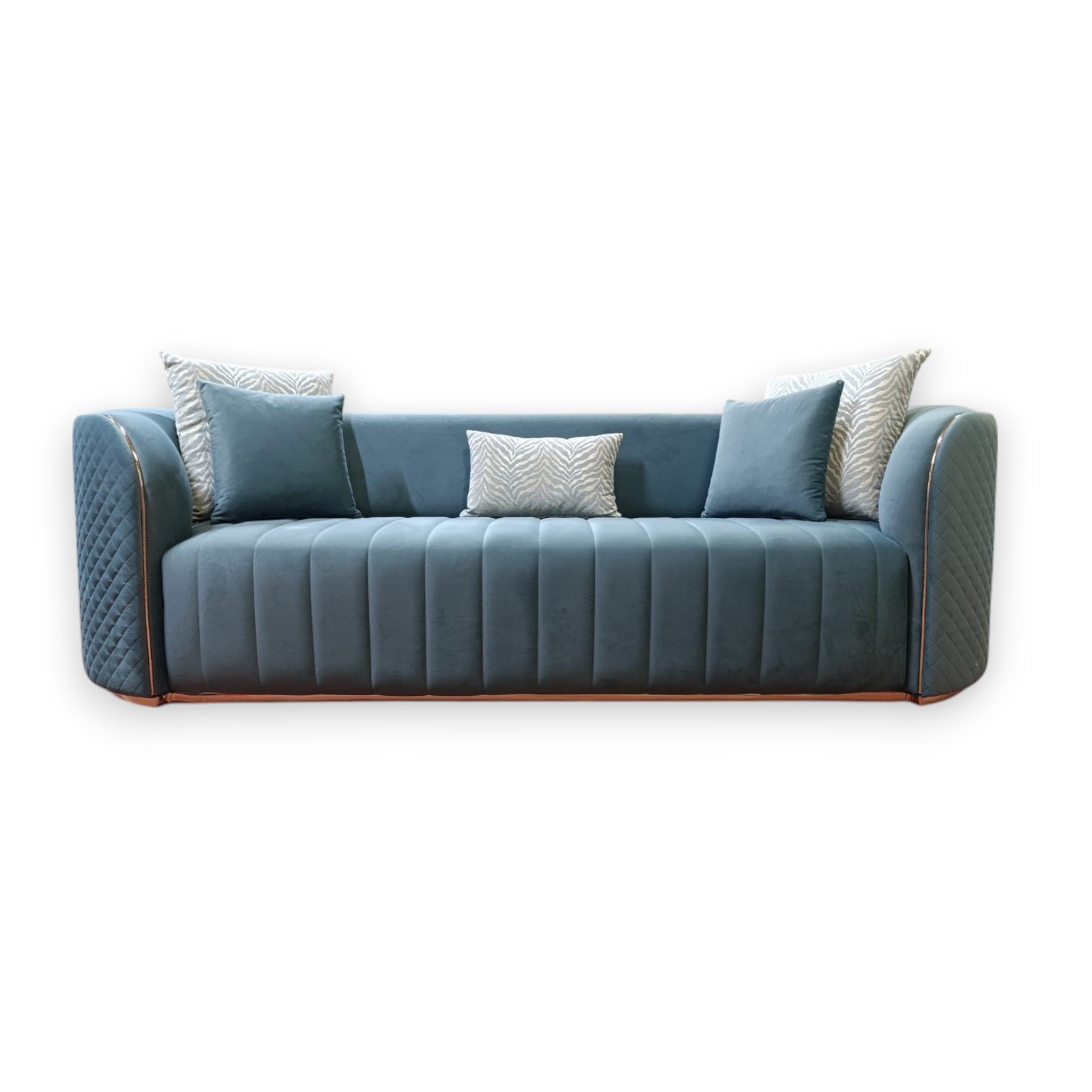 Blue sofa with decorative pillows on a white background