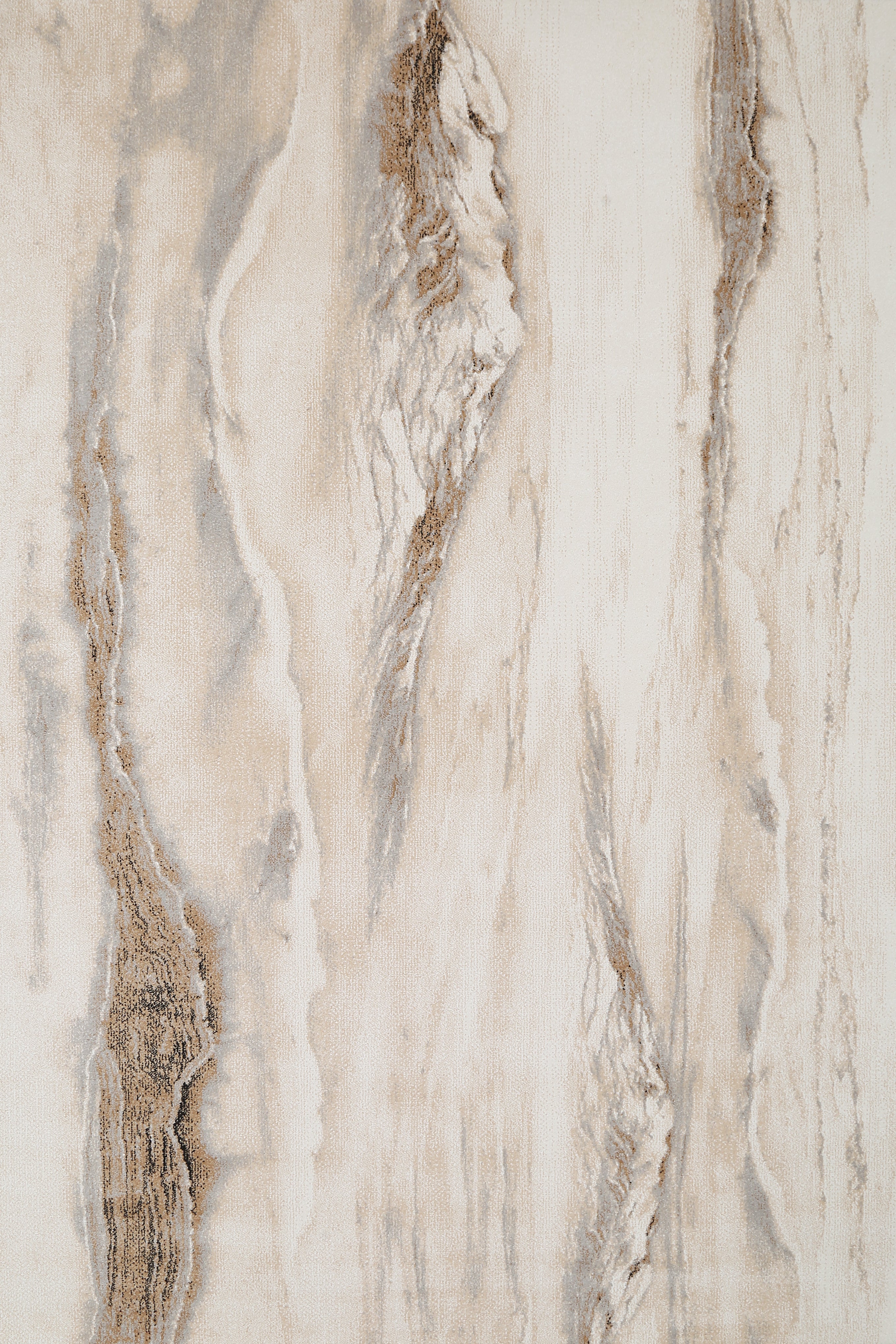 Close-up of a marble-like stone with beige and brown patterns