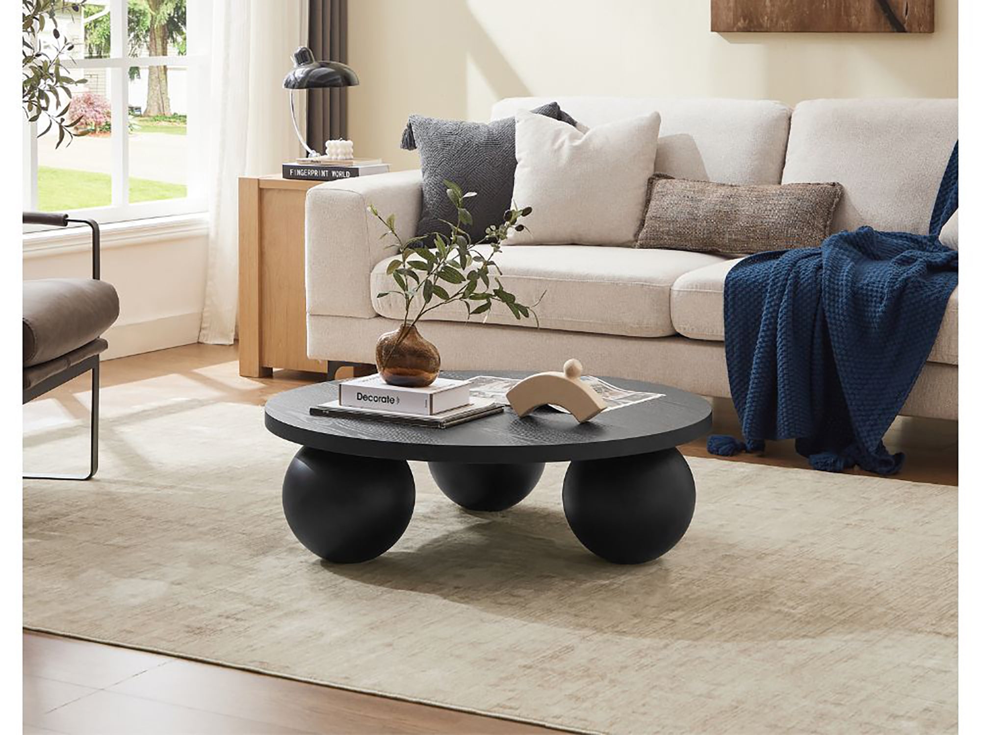 Luna Noir Round Coffee Table – Modern Elegance with Sculptural Legs (23ELG018B) - GLARA HOME