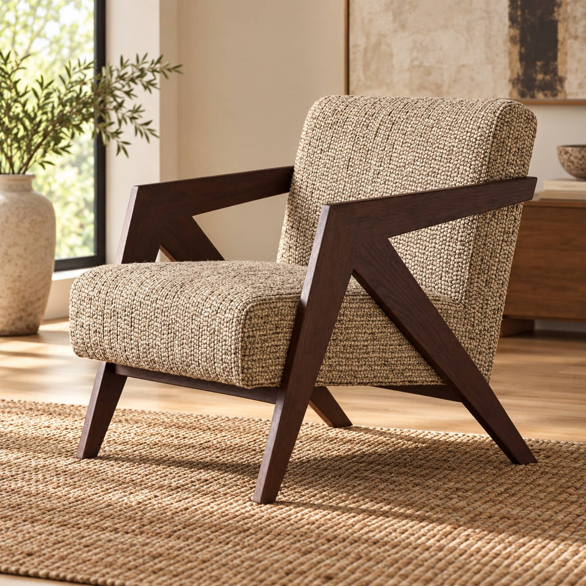 Beige textured accent chair with angular dark wood arms styled in a room.