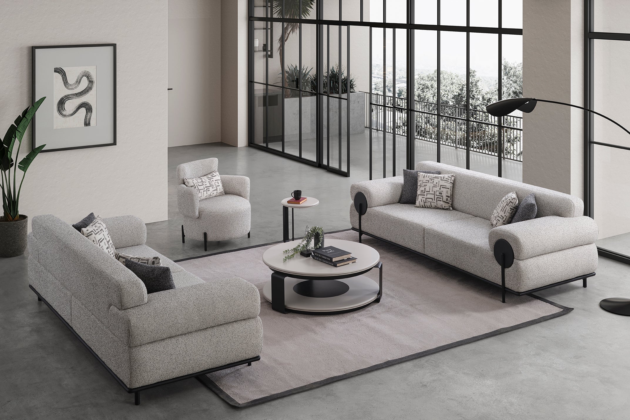 Modern living room with gray sofas, coffee table, and decorative items.