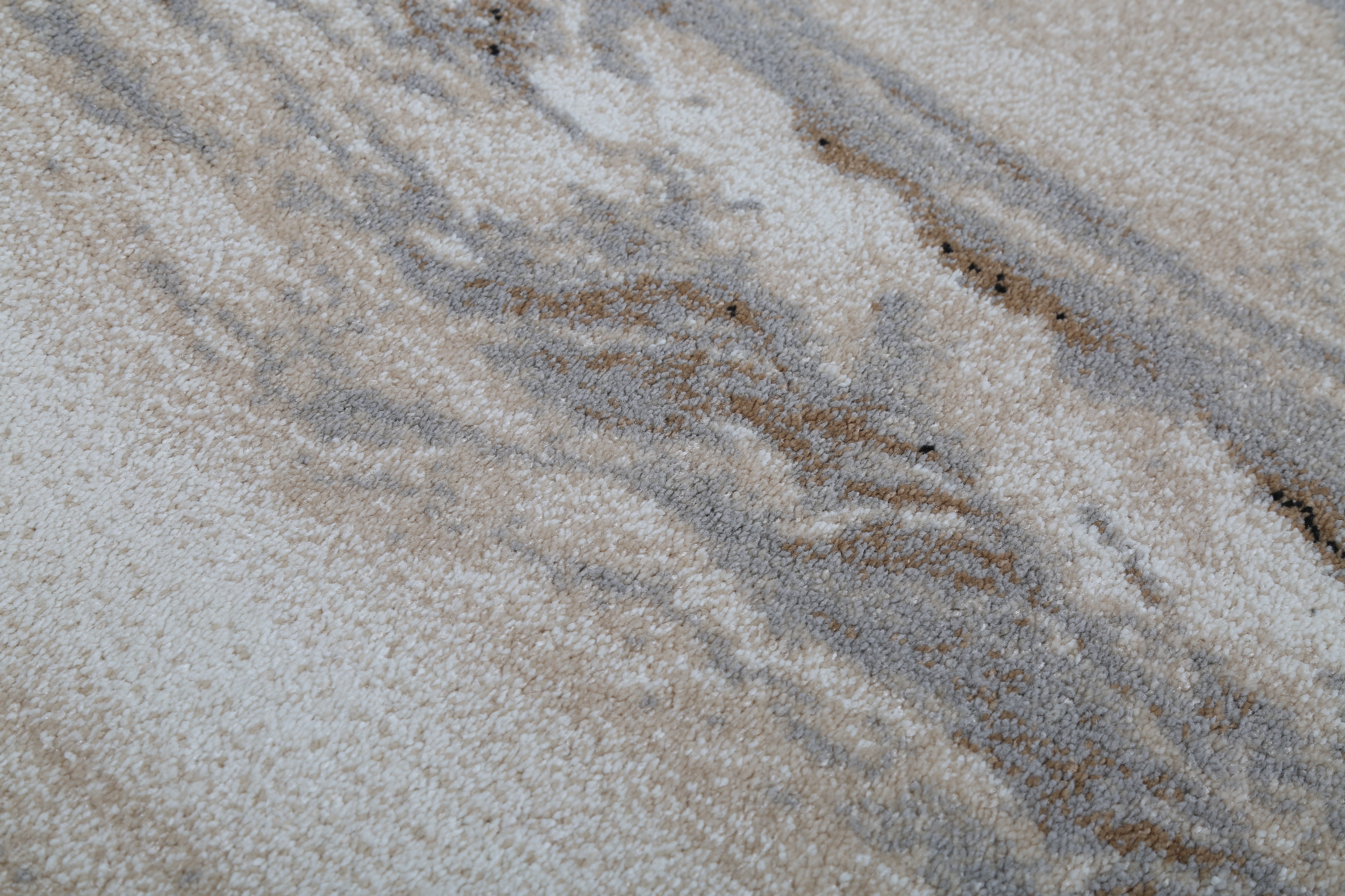 Close-up of a textured surface with brown and gray patterns