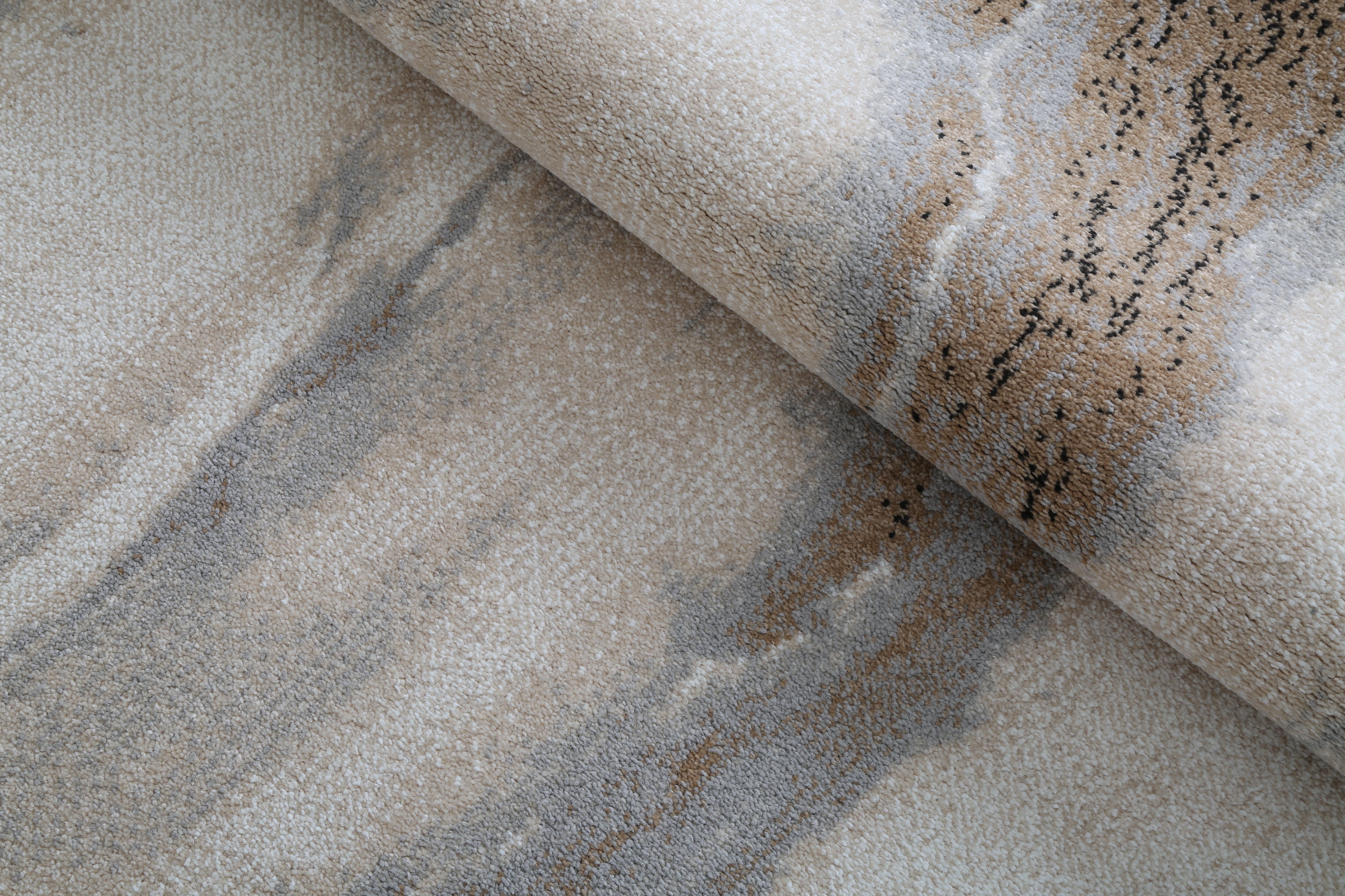 Close-up of textured fabric with brown and beige colors