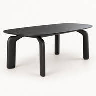 Avero black ceramic dining table with sculptural carbon steel legs on a neutral studio background