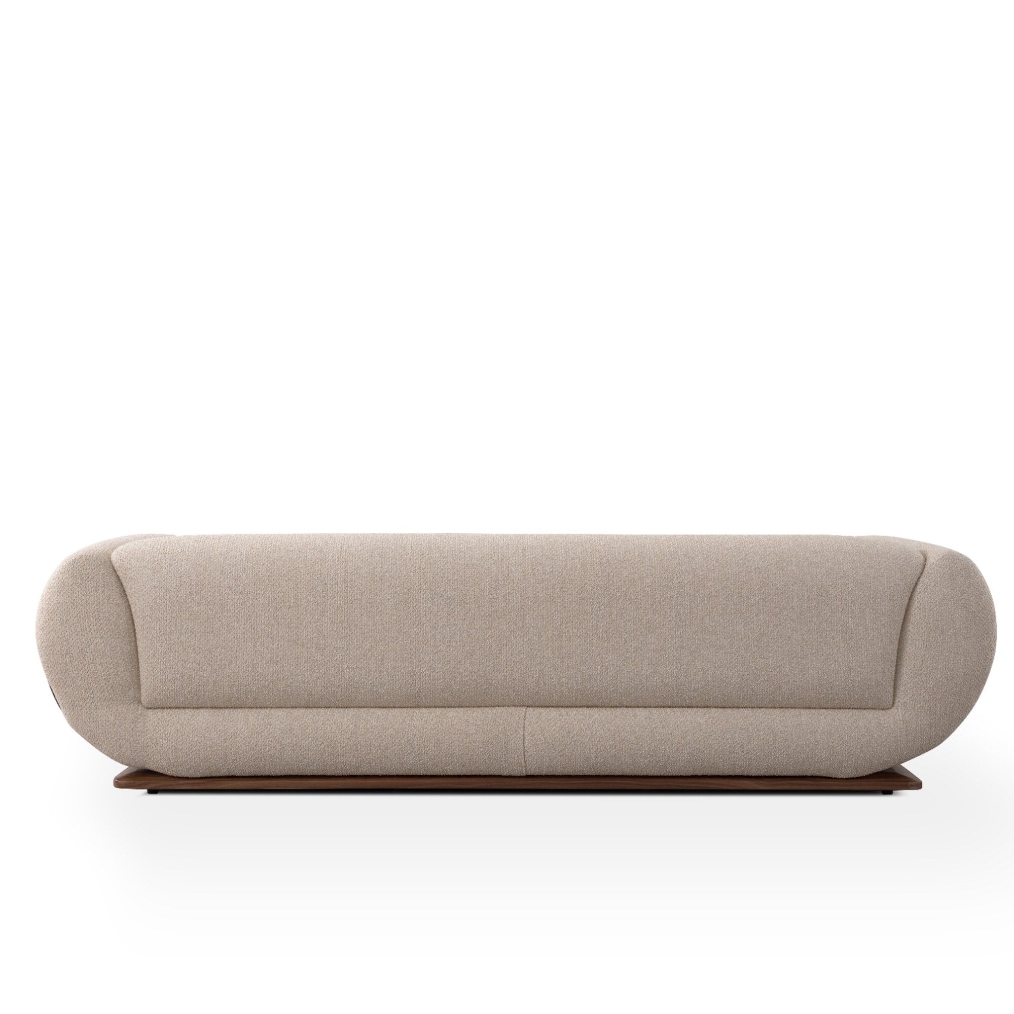 A modern low-profile sofa with a rounded barrel back and arms, upholstered in a light beige textured fabric and supported by a dark wood base, shown against a plain white background.