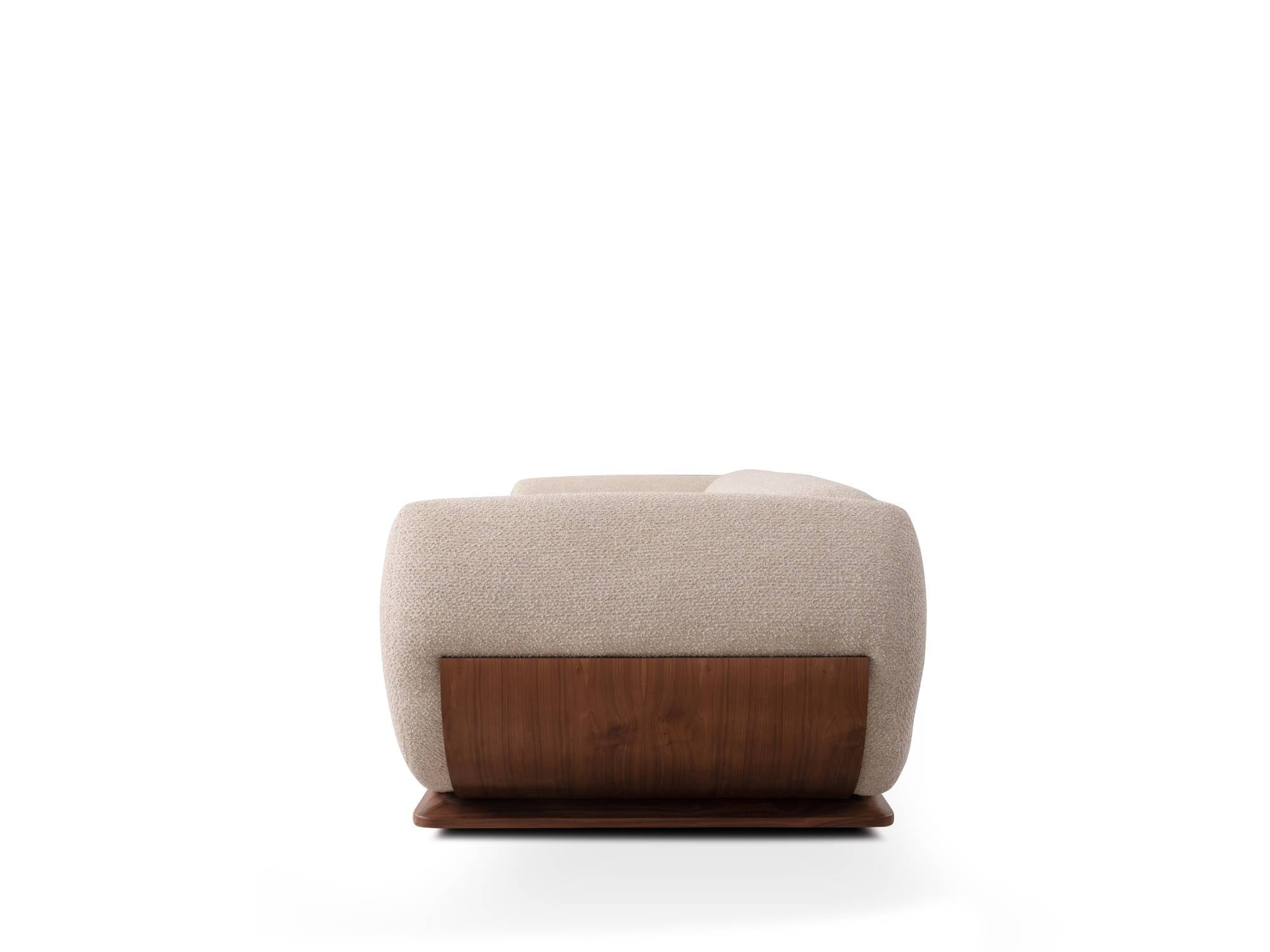 A modern low-profile armchair with a textured beige fabric upholstery and a contrasting dark brown wooden base, shown from a direct front angle on a white background.