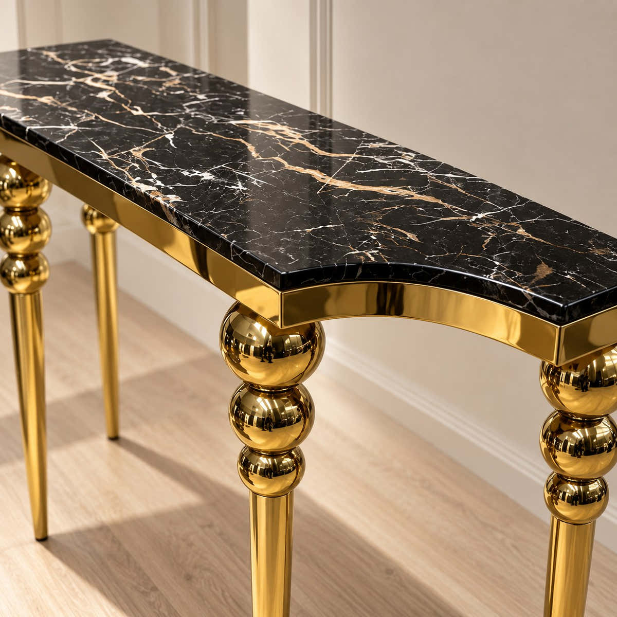 Black veined marble top and curved edge.