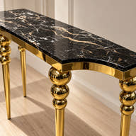 Black veined marble top and curved edge.
