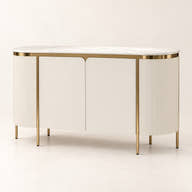 Cream fluted sideboard with pale top and metallic frame on a neutral background.