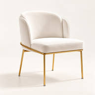 Off-white velvet dining chair with slim gold-tone frame on a neutral background.