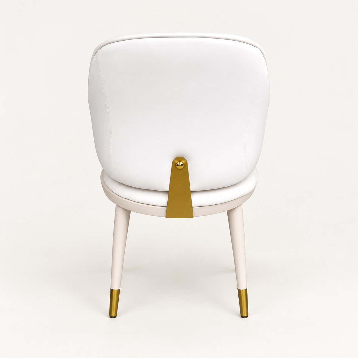 Upholstered seat edge and gold-tipped leg.