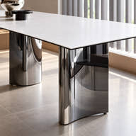 Thin white ceramic tabletop edge.