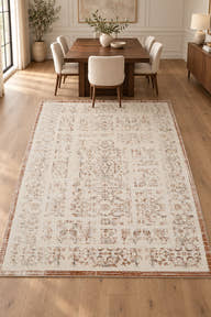 Aurelia FF-04 ivory and rust area rug in a digitally staged dining room with walnut table