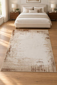 Sienna YC-08 ivory and caramel abstract rug in a digitally staged bedroom with cream upholstered bed