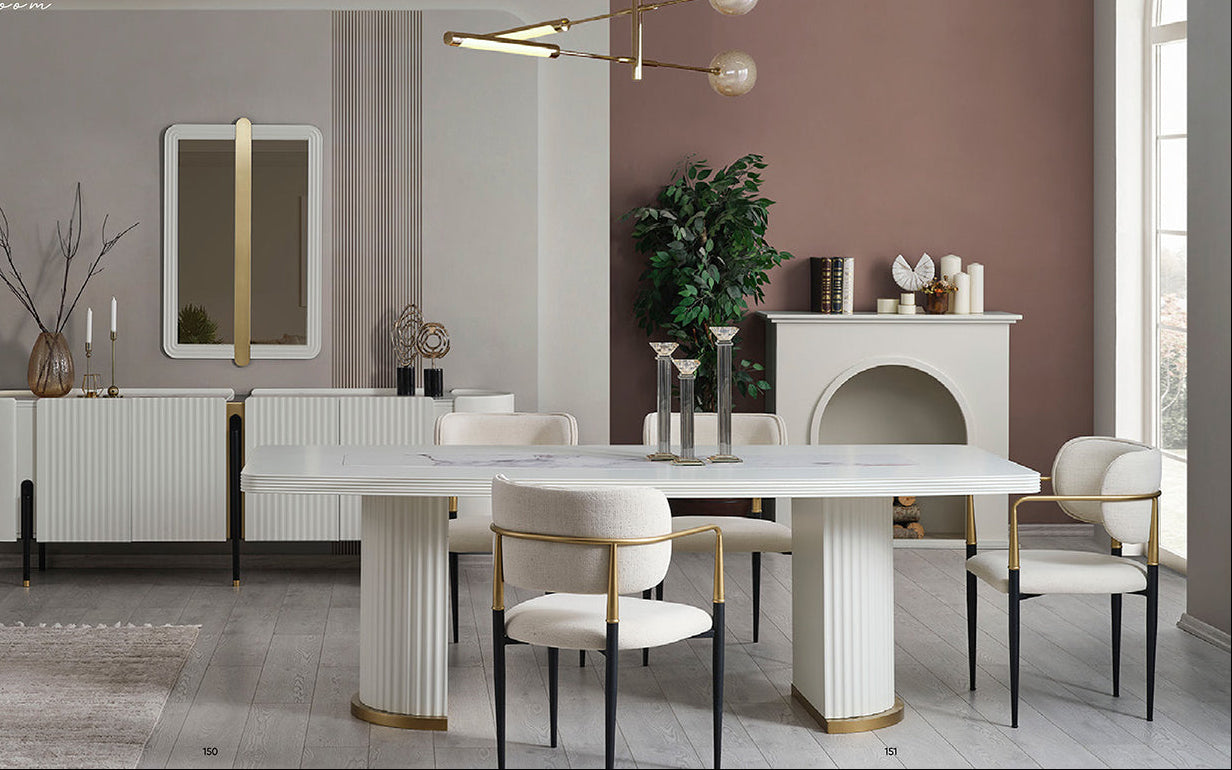 Modern dining room with white marble table and chairs, featuring the brand 'MONA'.