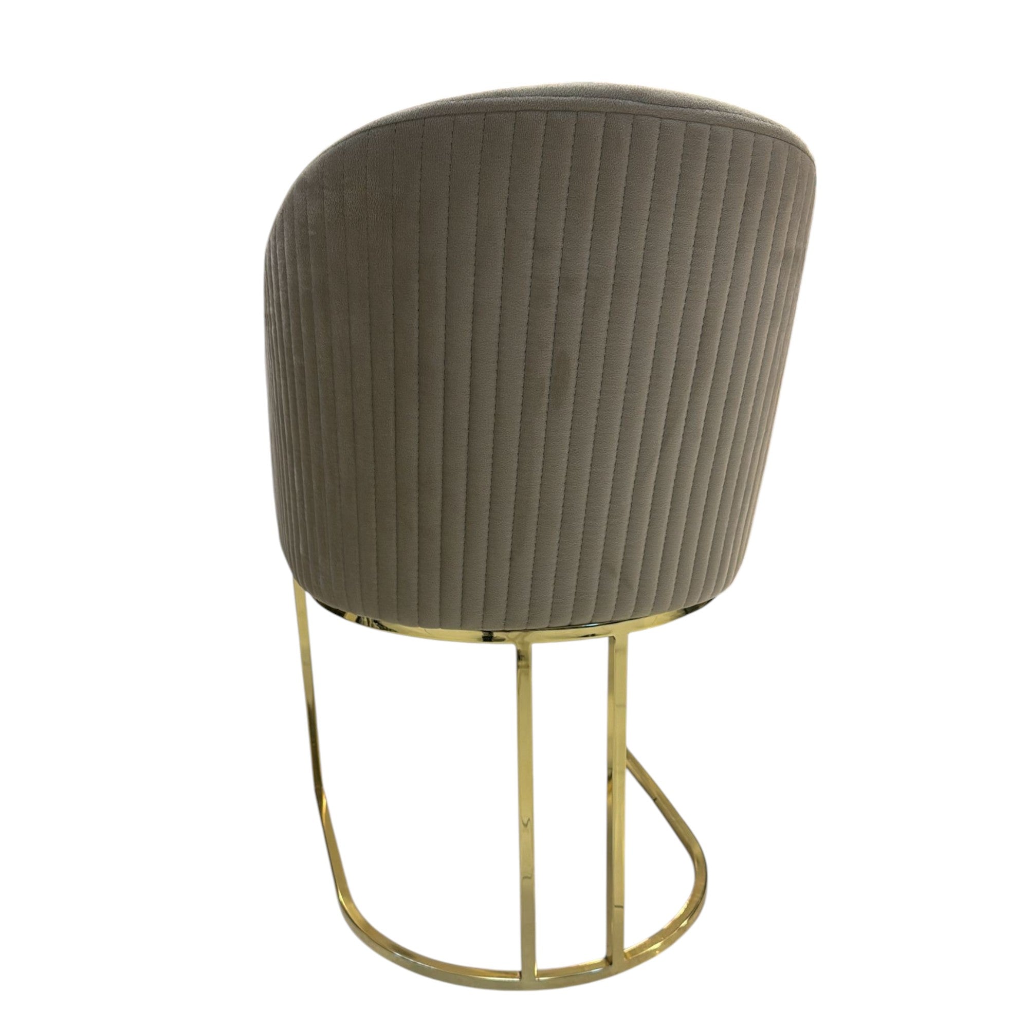 Chair with ribbed brown backrest and gold metal frame on a white background